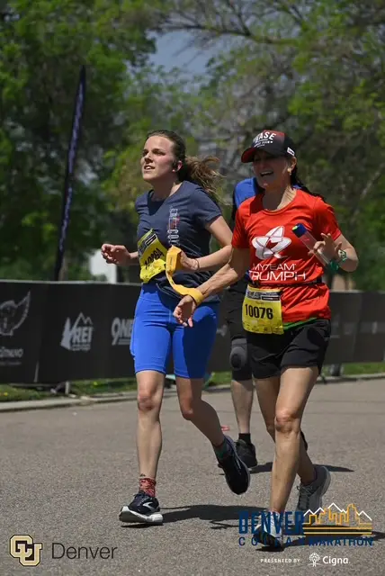 Runner guiding adaptive athlete